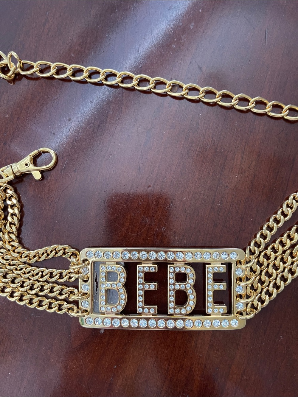 bebe Gold-Tone Logo Chain belt with Clear Crystals